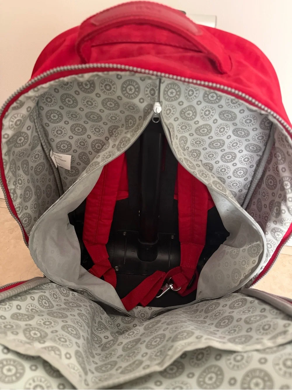 Kipling Bright Red Rolling Backpack with Monkey Charm